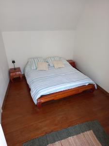Ένα ή περισσότερα κρεβάτια σε δωμάτιο στο Ce Petit Penty +4 φωτογραφίες