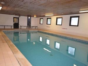 a large swimming pool in a large room at 3 Bed in Crediton WAIEC in Zeal Monachorum