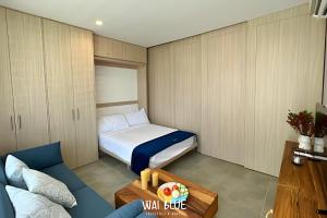 Un pat sau paturi într-o cameră la Wai Blue /Salguero Suites /Balcon/Vista MAR/SSG05 +37 fotografii
