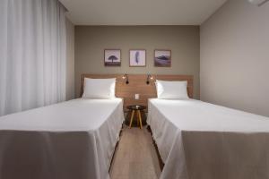 Ένα ή περισσότερα κρεβάτια σε δωμάτιο στο Soft Inn Alagoinhas +113 φωτογραφίες