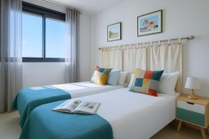 Posteľ alebo postele v izbe v ubytovaní Apartamento Seascape. Relax, lujo y vistas al mar.