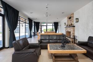 Posezení v ubytování Hotel Qvevrebi