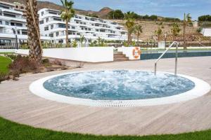 Bazén v ubytovaní Apartamento Seascape. Relax, lujo y vistas al mar. alebo v jeho blízkosti