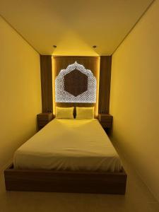 Ένα ή περισσότερα κρεβάτια σε δωμάτιο στο STUDIO HIGH LuX 01