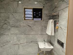 Koupelna v ubytování Hotel Airpoint + 15 fotografií