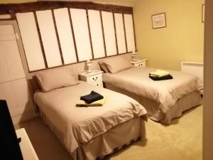 Voodi või voodid majutusasutuse Black Horse Cottage toas