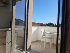 サンタンティーオコにあるMariposaのバルコニー(テーブル、椅子付)が備わります。