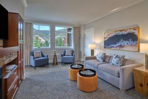 a living room with a couch and two chairs at The Westin Riverfront Mountain Villas, Beaver Creek Mountain in Avon