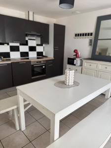 Η κουζίνα ή μικρή κουζίνα στο Appartement 80m2 3 chambres 5 lits