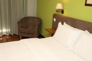 Ein Bett oder Betten in einem Zimmer der Unterkunft Hotel Ribadouro