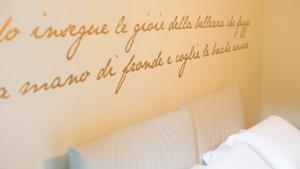A bed or beds in a room at Domus Corsini