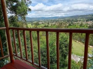 a view from the balcony of a house at Hospedaje campestre Esmeraldas in Duitama