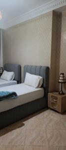 two beds in a room with at Enjoy appartemet in Essaouira