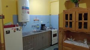 Køkken eller tekøkken på Departamento 2 ambientes PB a metros del mar + 4 billeder