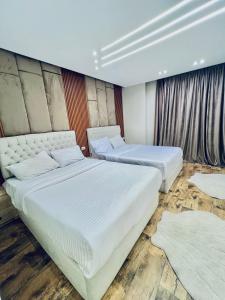 Ένα ή περισσότερα κρεβάτια σε δωμάτιο στο Atta pyramid view inn +15 φωτογραφίες