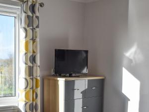 TV a/nebo společenská místnost v ubytování Seaview + 16 fotografií