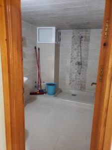 Koupelna v ubytování Appartement cosy tout confort + 3 fotografie
