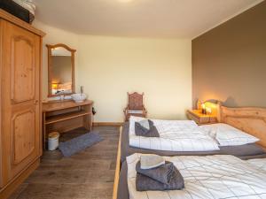Postel nebo postele na pokoji v ubytování Bastogne Farmhouse Escape