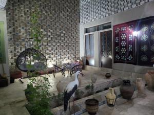 Сад в Hotel Gulnaraxanum Boutique This hotel is nearby the center of the old city Every room decorated in the unique style