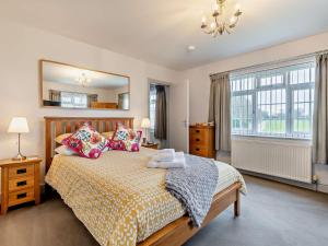 Voodi või voodid majutusasutuse 3 Bed in Winterton-on-Sea 46478 toas