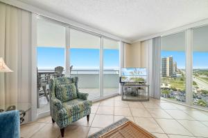 a living room with a view of the ocean at Perdido Sun Unit 914 in Pensacola +34 photos