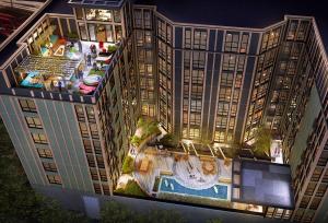 an overhead view of a building with a swimming pool at 3 Modern 2BR Apts Near Kerrytown w Parking & Gym in Ann Arbor