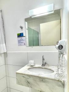 Ένα μπάνιο στο Hotel Concord e Eventos corporativos Campo Grande +35 φωτογραφίες