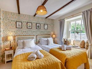 En eller flere senge i et værelse på 3 Bed in Ulverston oc-sz445