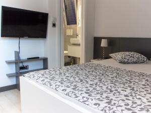 Postel nebo postele na pokoji v ubytování Apartments Petra + 37 fotografií