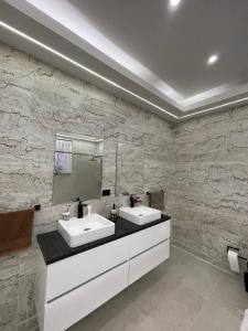 Koupelna v ubytování Villa del túnel