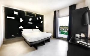 Voodi või voodid majutusasutuse Addauro Resort toas