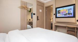 Μια τηλεόραση ή/και κέντρο ψυχαγωγίας στο Green Tree Inn Nanjing Xinjiekou Wangfu Avenue
