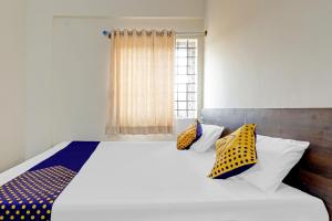 Fotografie z fotogalerie ubytování SPOT ON 78782 Hotel Om Classic v destinaci Sarjāpur