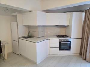 Køkken eller tekøkken på C&Y Apartments Metropol + 5 billeder