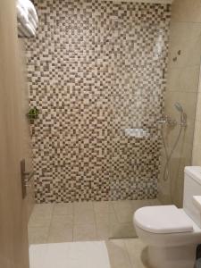 Un baño de Anetis Beach Hotel 87 fotos más