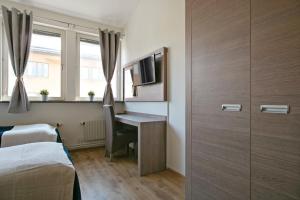 TV a/nebo společenská místnost v ubytování Hotel Kringelstaden