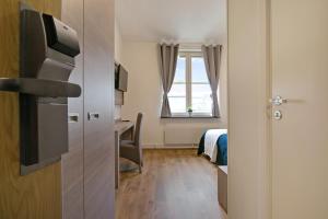 TV a/nebo společenská místnost v ubytování Hotel Kringelstaden