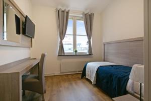 TV a/nebo společenská místnost v ubytování Hotel Kringelstaden