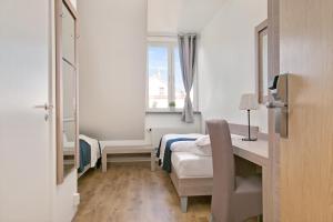 Postel nebo postele na pokoji v ubytování Hotel Kringelstaden