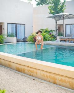 Bazén v ubytování Faisano Boutique Hotel by Cruz Hoteles nebo v jeho okolí
