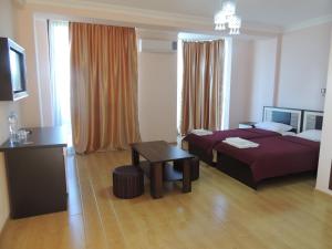 מיטה או מיטות בחדר ב-Hotel ''Premium Palace''