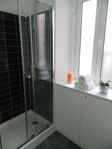 Ένα μπάνιο στο Enjoy Casa do Forte Apartment