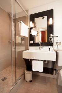 Um banheiro em Hotel Villa Florentina