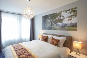 Letto o letti in una camera di Hotel Temse