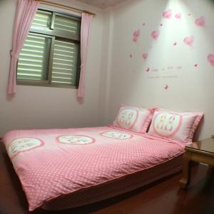 Postel nebo postele na pokoji v ubytování Sweetfishs Homestay