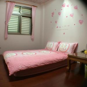 Postel nebo postele na pokoji v ubytování Sweetfishs Homestay