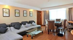 Χώρος καθιστικού στο GreenTree Inn Taizhou Gaogang District Business Hotel