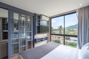 Ένα ή περισσότερα κρεβάτια σε δωμάτιο στο C223 Condo 1BR Suite with Rooftop Pool 1km to Beach +34 φωτογραφίες