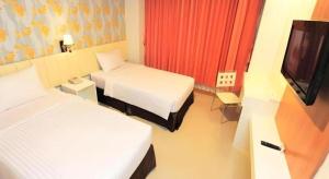 Postel nebo postele na pokoji v ubytování Pratunam Hotel + 73 fotografií