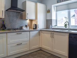 Kuchyň nebo kuchyňský kout v ubytování Birkby Lodge